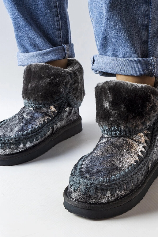 Botas metálicas grises de invierno,...