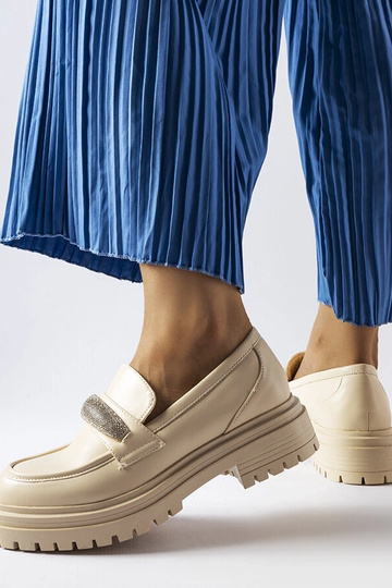 Mocasines beige con...