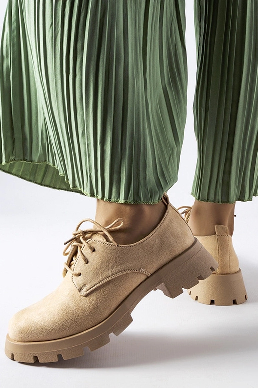 Botas de media caña beige con suela...