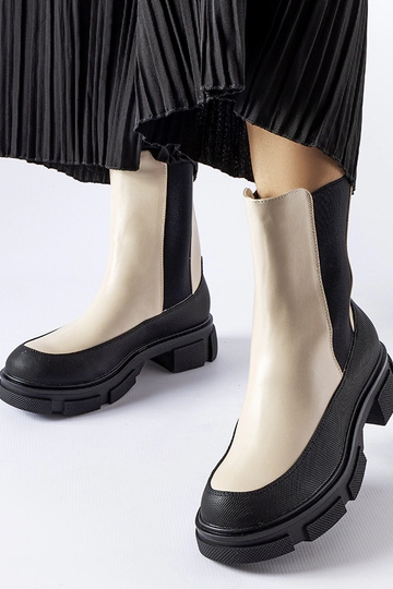 Botines Faisal sin cordones en color beige y negro