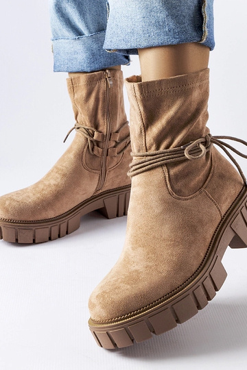 Botines con cordones beige...