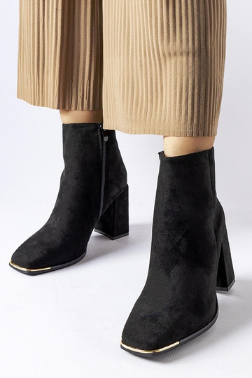 Botas negras de tacón de...