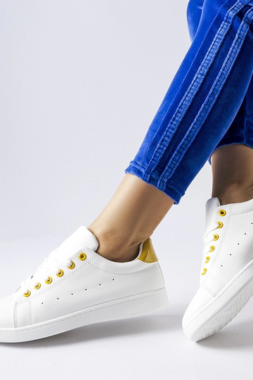 Zapatillas blancas con detalles amarillos Bushnell 2