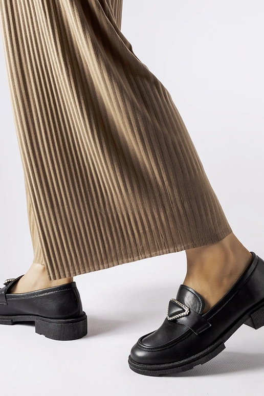 Mocasines negros decorados con...