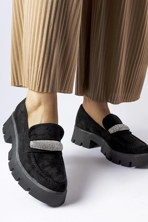 Mocasines negros con suela maciza...