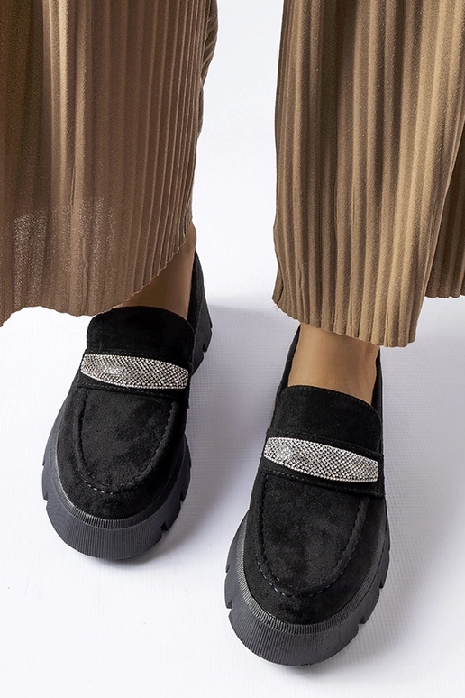 Mocasines negros con suela maciza...