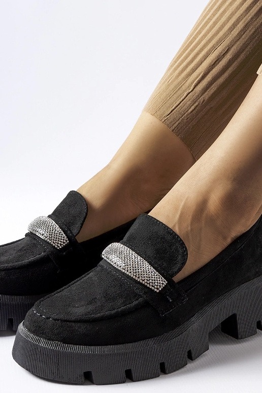 Mocasines negros con suela maciza...