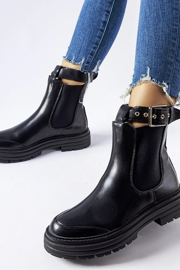 Botines negros con cierre...