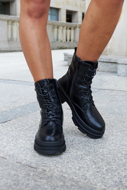 Botas negras aislantes con imperdible...