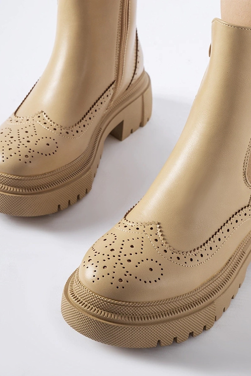 Botines beige oscuro con costuras...