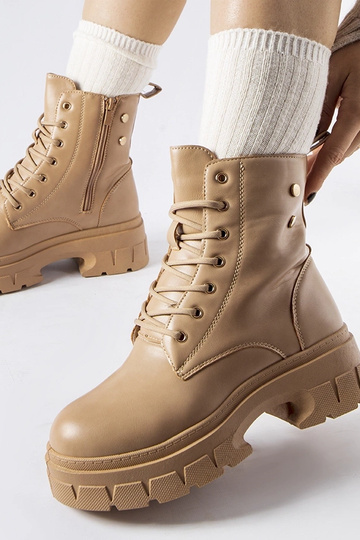 Trabajadores beige con...