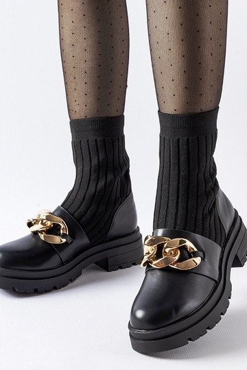 Botines negros tipo...