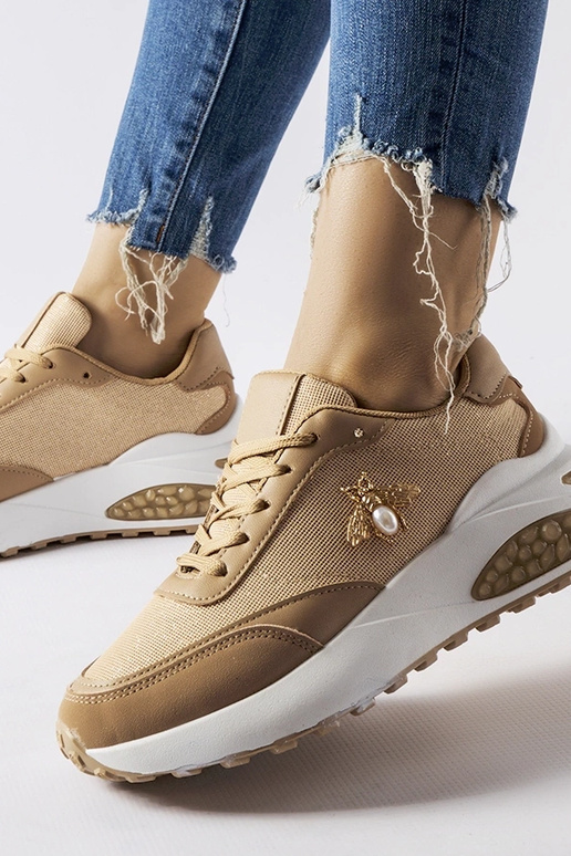 Zapatillas marrones y blancas con...