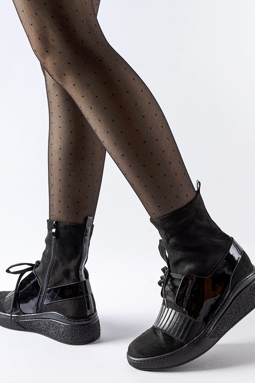 Botas negras con cuña tipo calcetín...