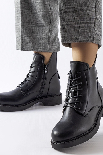 Botas planas asimétricas...