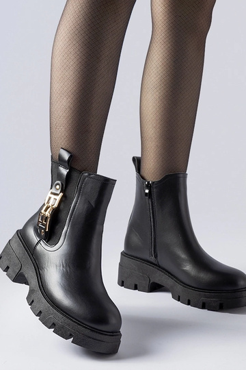 Botines negros robustos con...