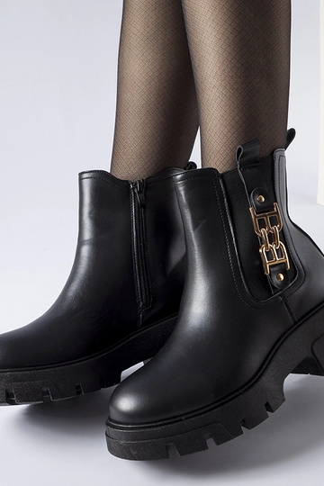 Botines negros robustos con... 2