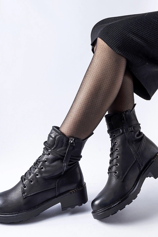 Botines negros con cremallera...