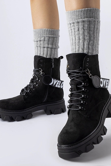 Botines negros con tira...