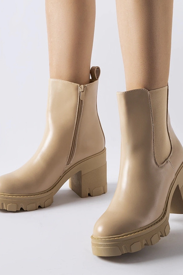 Botines acolchados beige...