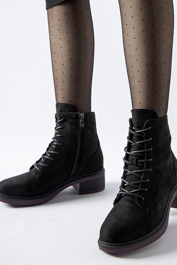 Botines clásicos negros con suela morada Teo