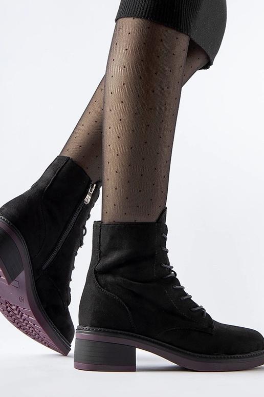 Botines clásicos negros con suela...