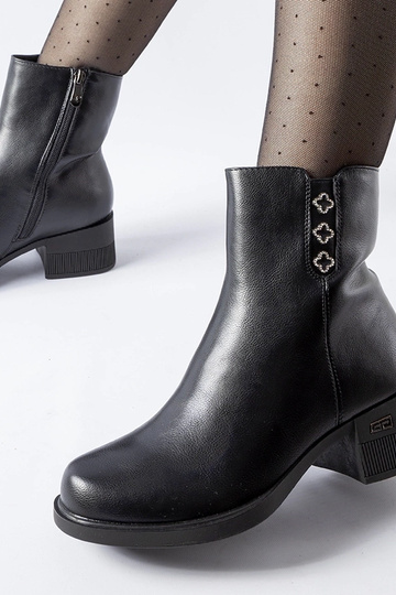 Botines negros forrados con... 2