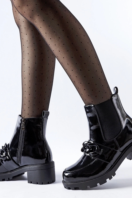Botas negras de charol con hebilla y...