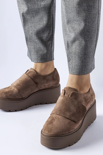 Zapatos marrones en...