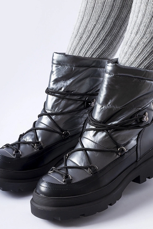 Botas de nieve con puños negros y...