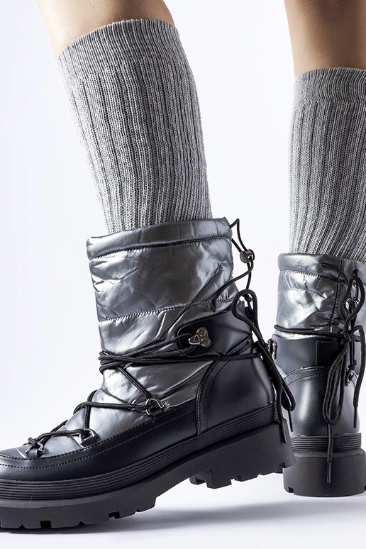 Botas de nieve con puños negros y...