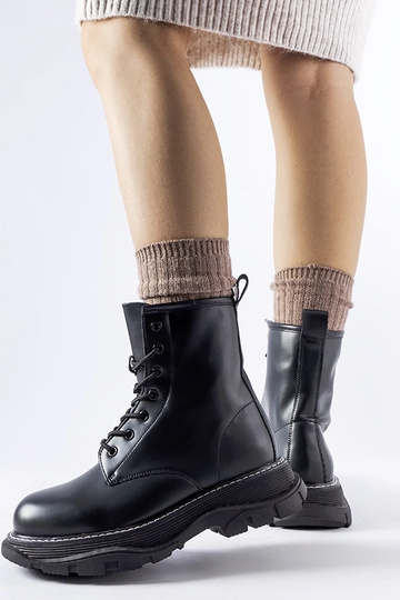 Zapatos de obreros negros...