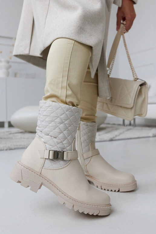 Botines beige con pespuntes...