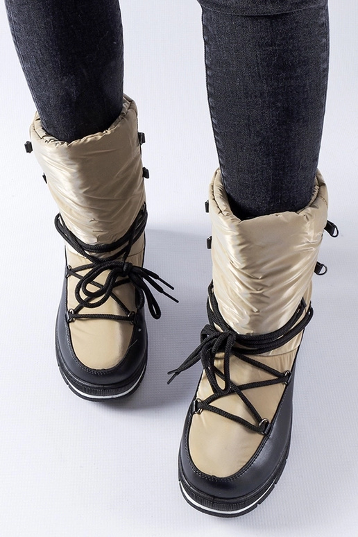 Botas de nieve en plataforma marrón...