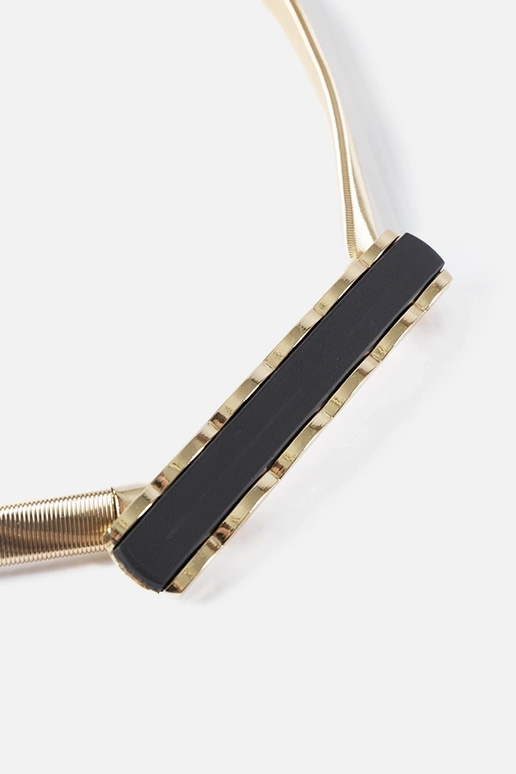 Cinturón elástico dorado con hebilla...