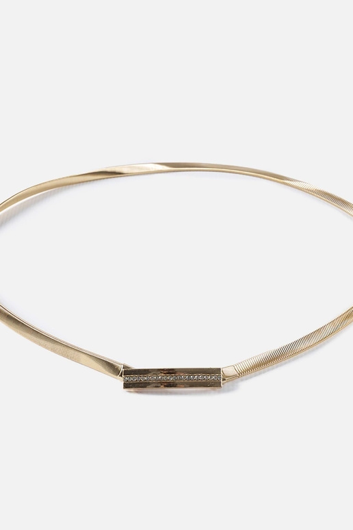 Correa elástica dorada con circonitas...