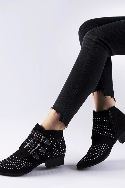 Botines decorativos negros con tacón...