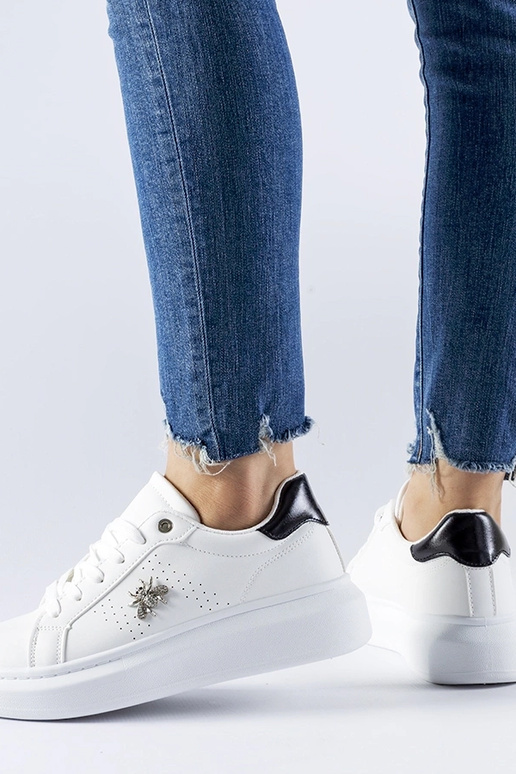 Zapatillas blancas con aplicación de...