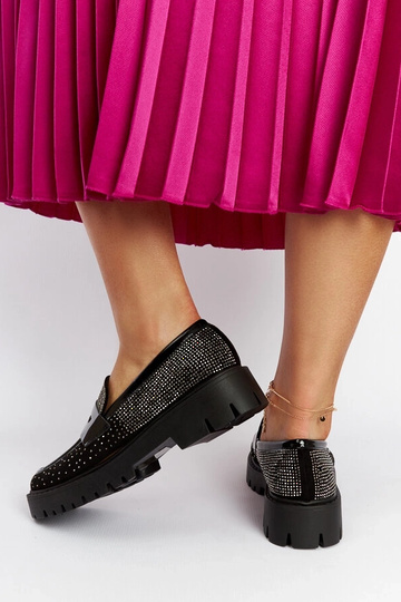 Mocasines negros decorados... 2