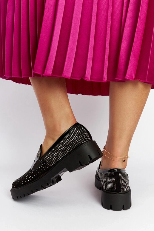 Mocasines negros decorados con...