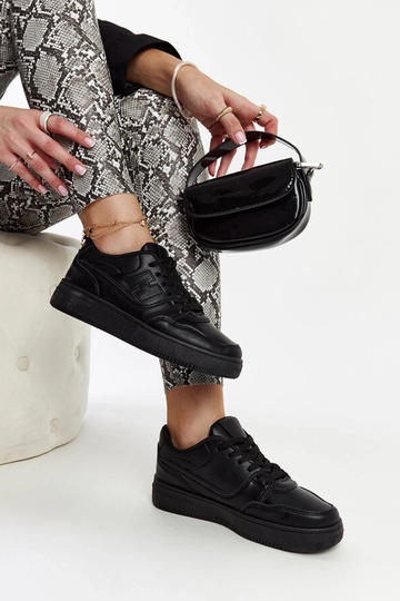 Zapatillas negras con... 2