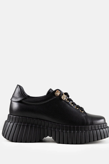 Zapatillas negras de piel con plataforma Karino
