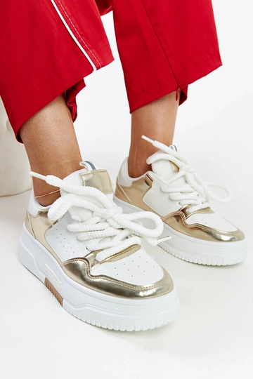 Zapatillas de plataforma alta Farkas blancas y doradas