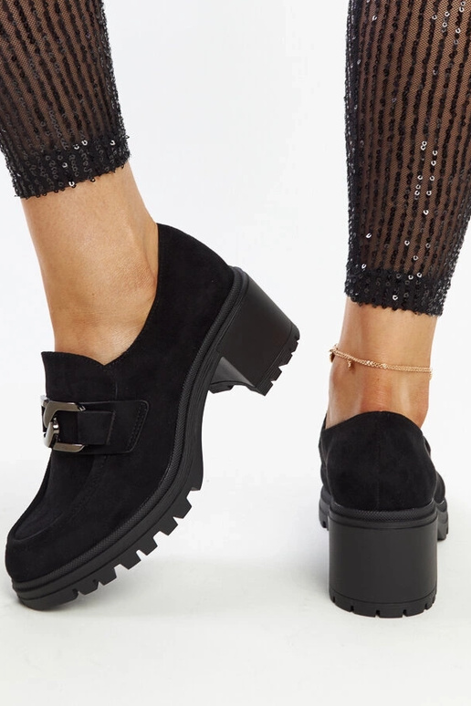 Zapatos negros con plantilla de cuero...