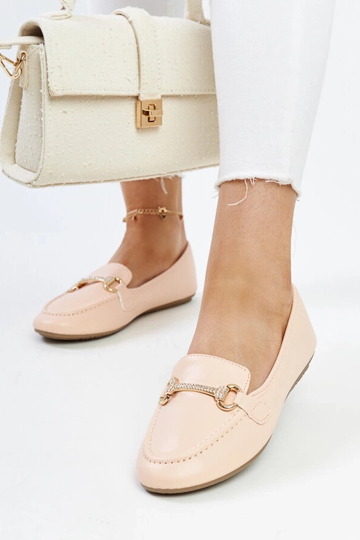 Mocasines beige con hebilla...
