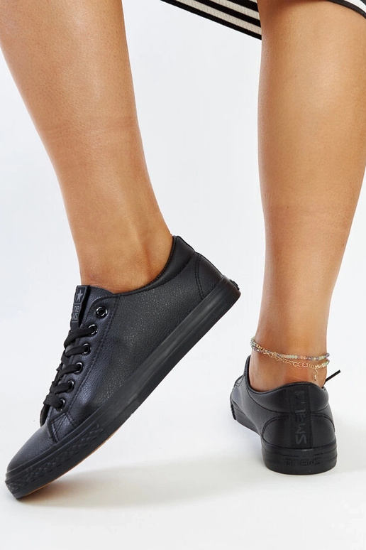 Zapatillas deportivas negras de piel...