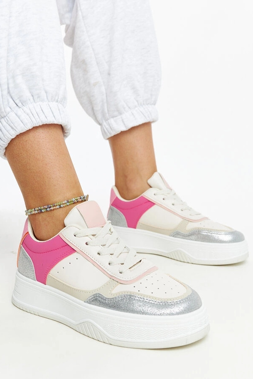 Zapatillas blancas y rosas con suela...