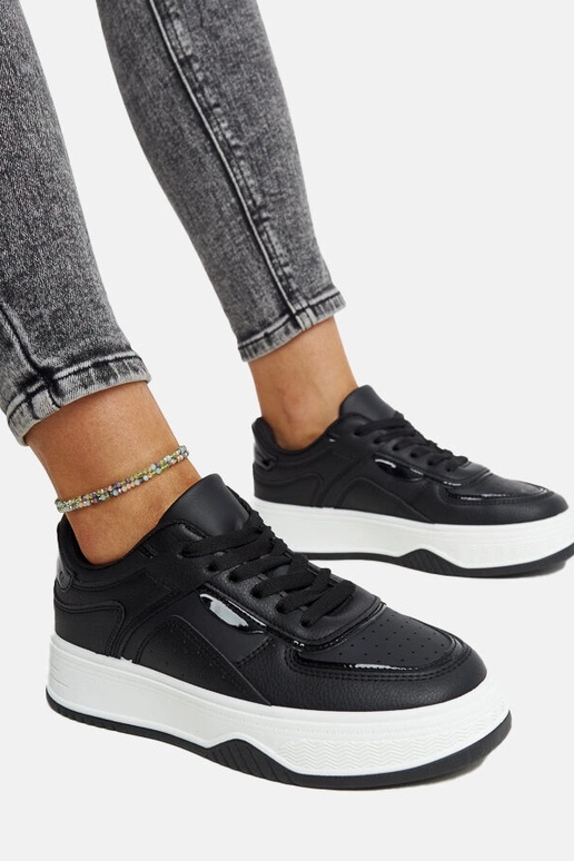 Zapatillas negras con suela más...