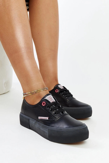 Zapatillas negras mujer...