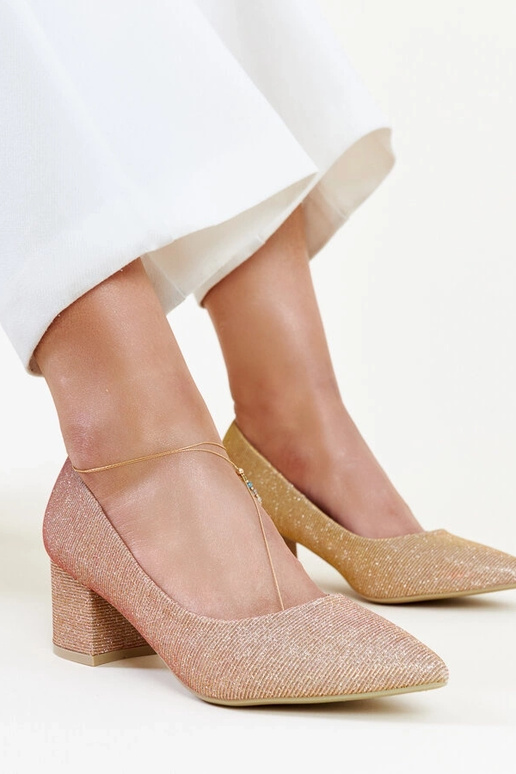 Zapatos de salón rosas brillantes con...